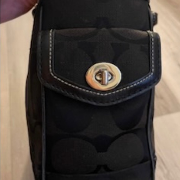 It’s a large signature C coach logo printed all over it - Picture 6 of 15